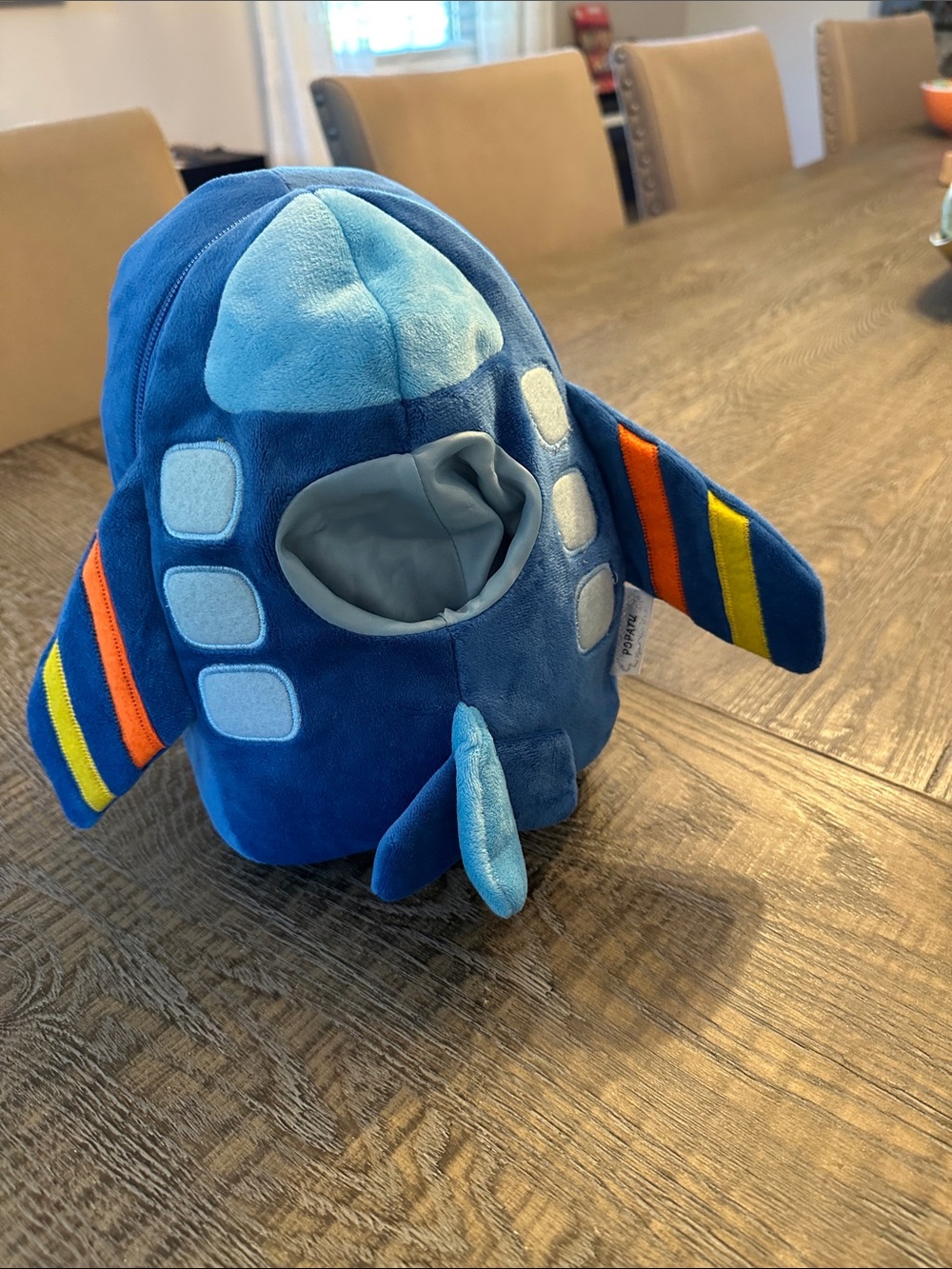 Popatu Small Blue Plush Airplane backpack with Yellow and Orange Wing Stripes